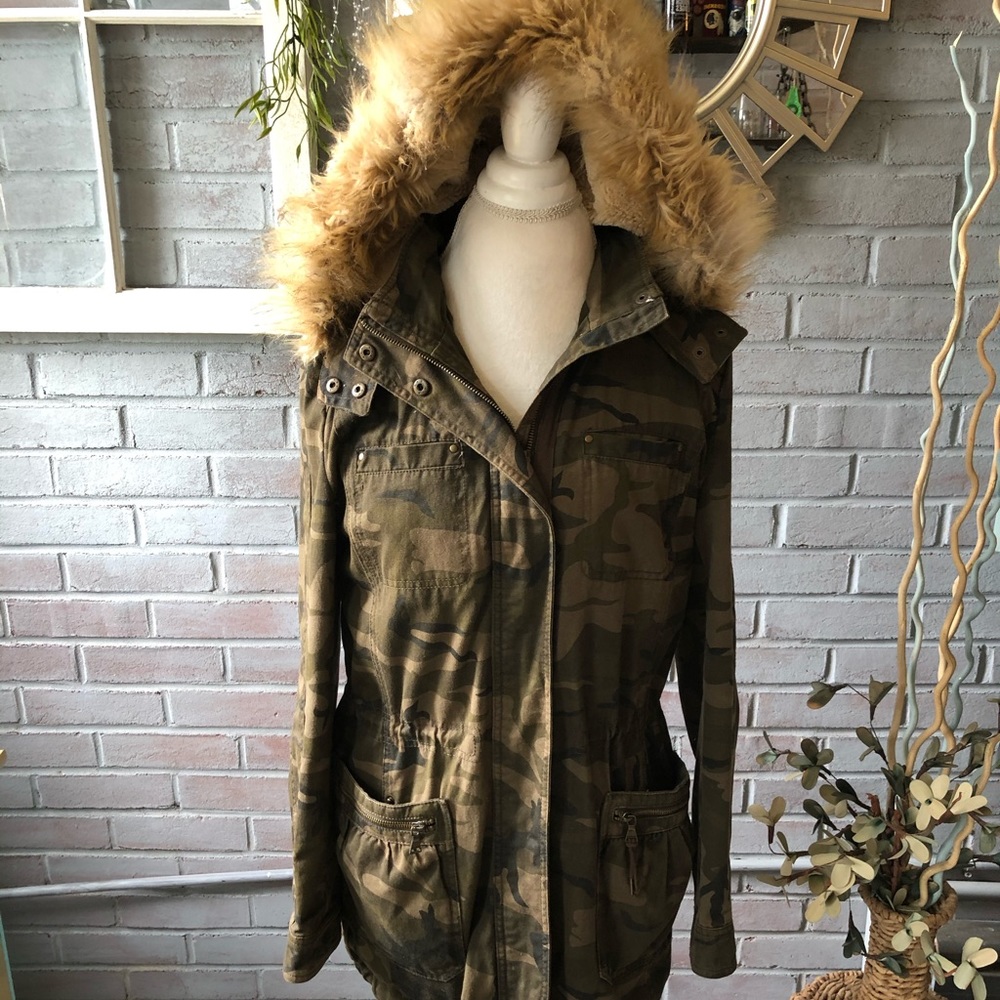 Express woman’s coat, camouflage, size small.
